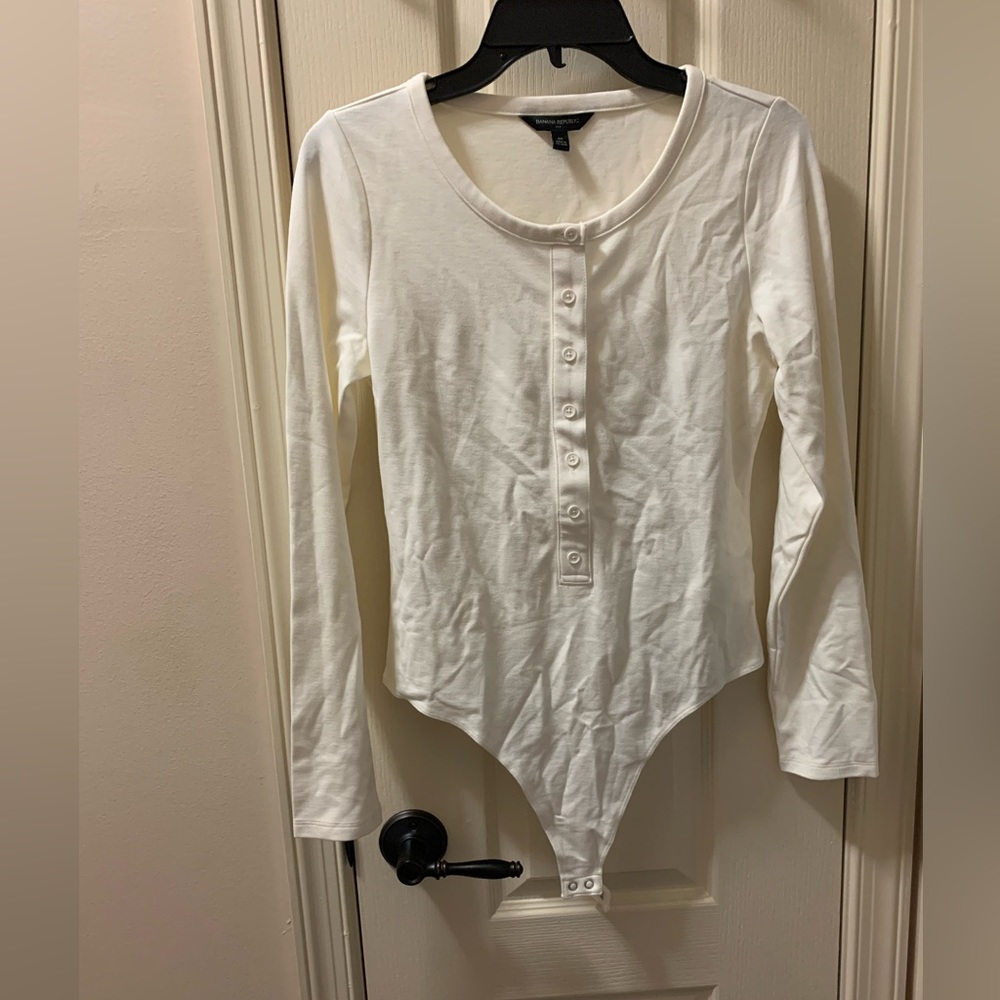 NWT White button up body suit, thong style